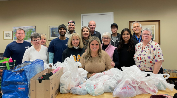 Mission to Seafarer volunteers packing ditty bags for seafarers