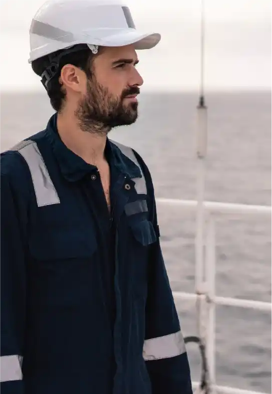 A seafarer looks ou9t at sea and misses his family.
